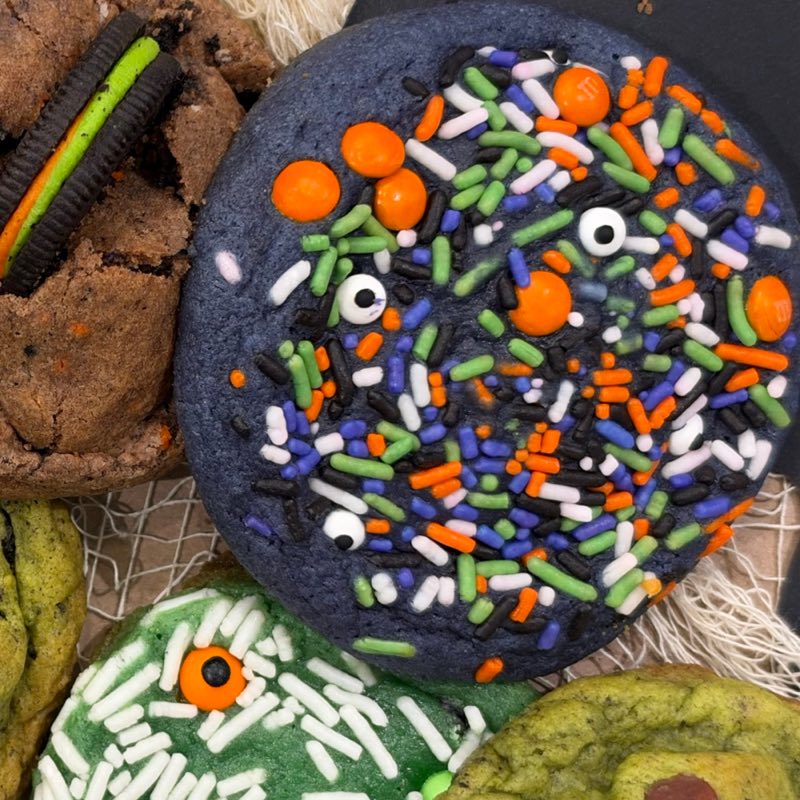 Sprinkle cookie loaded with Halloween sprinkles and candy eyeballs